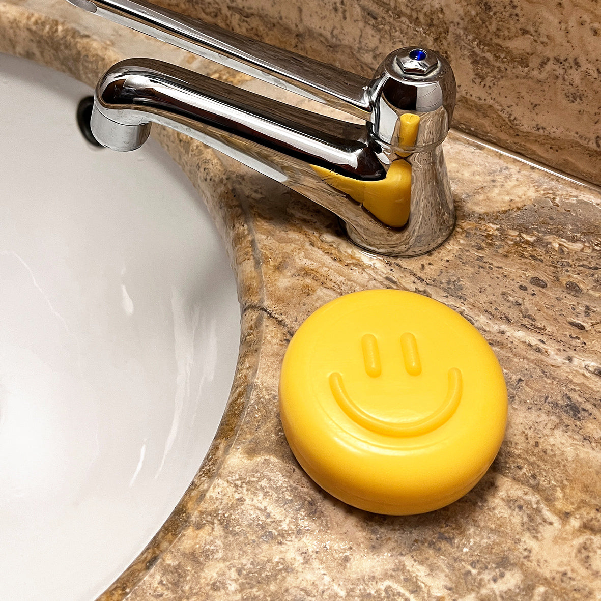 Feste Seife gelb mit Smiley-Gesicht, rund
