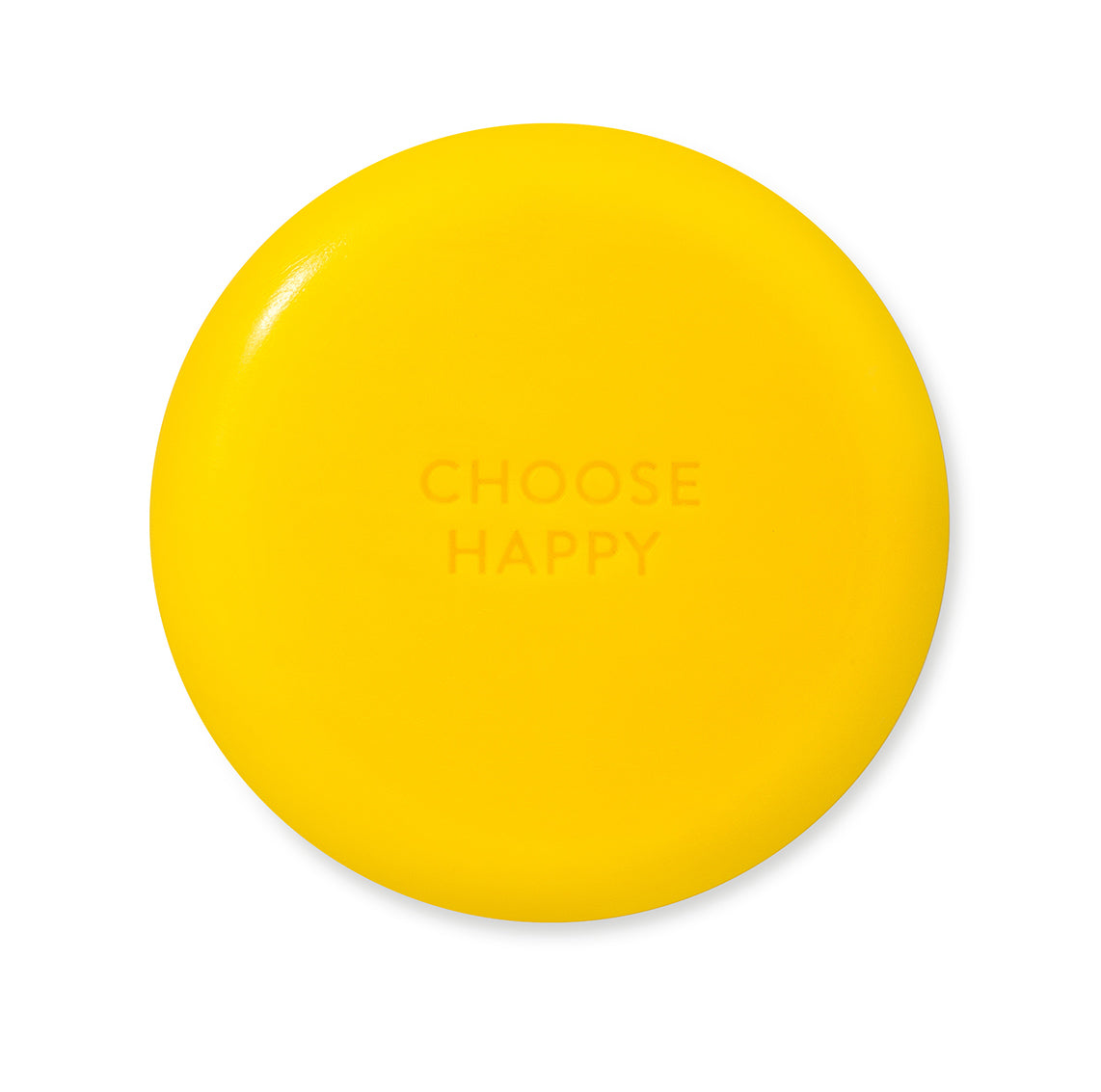 Auf der Rückseite der runden, gelben Smiley-Seife steht "choose happy"