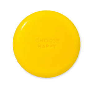 gelbe, runde Seife choose happy steht auf Rückseite